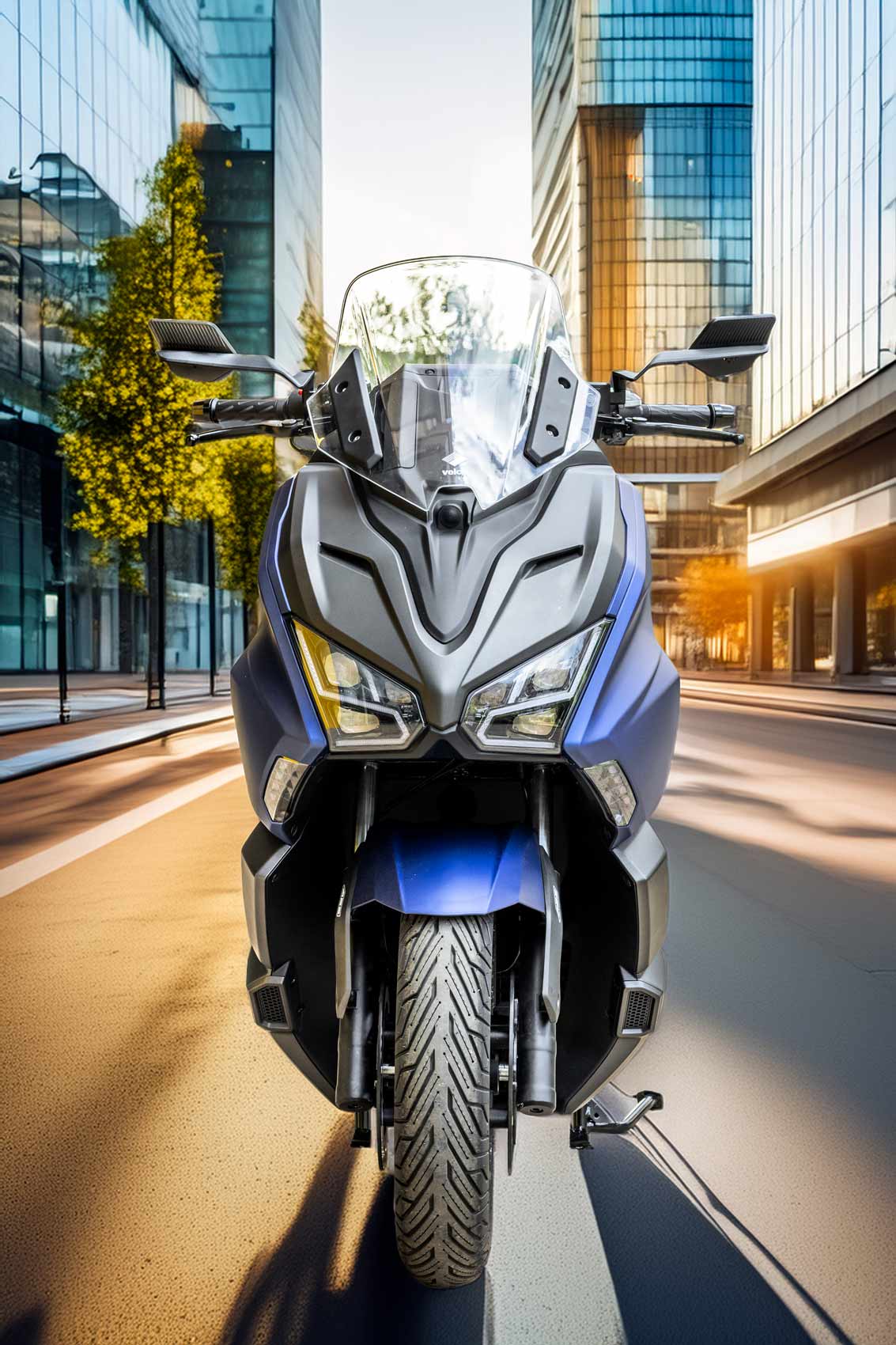 EMAX S vista frontale simmetrica in strada urbana tra i grattacieli